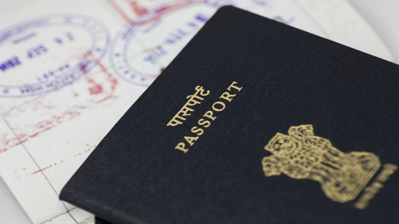 man tears passport pages Bangkok trips in Mumbai 