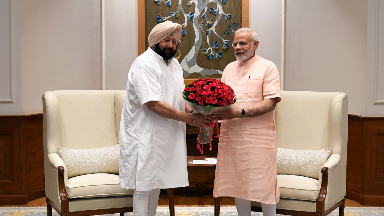 पंजाब: AAP से हताश, BJP के साथ, कैसे बदला पंजाबियों का मूड? Caption Amarinder and Narendra Modi